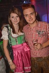 Dirndl vs. Lederhosn 12987735