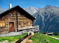 Gruppenavatar von Deutsche glauben wir Österreicher wohnen auf Almhütten in den Bergen.
