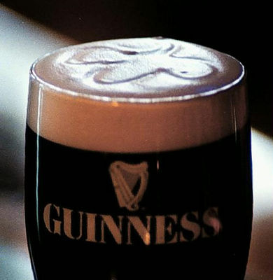 Gruppenavatar von Guinness is a black sweet beer with a funny foam