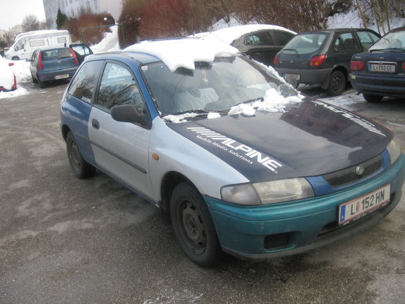 mei ex mazda 323  - 