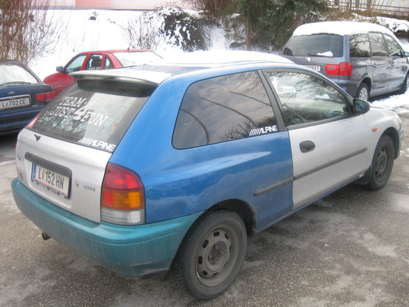 mei ex mazda 323  - 