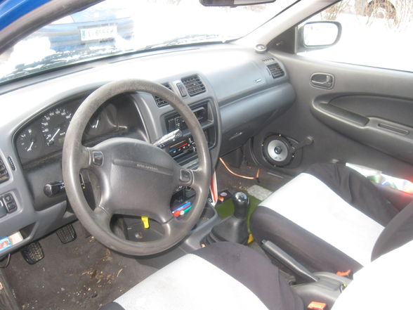 mei ex mazda 323  - 